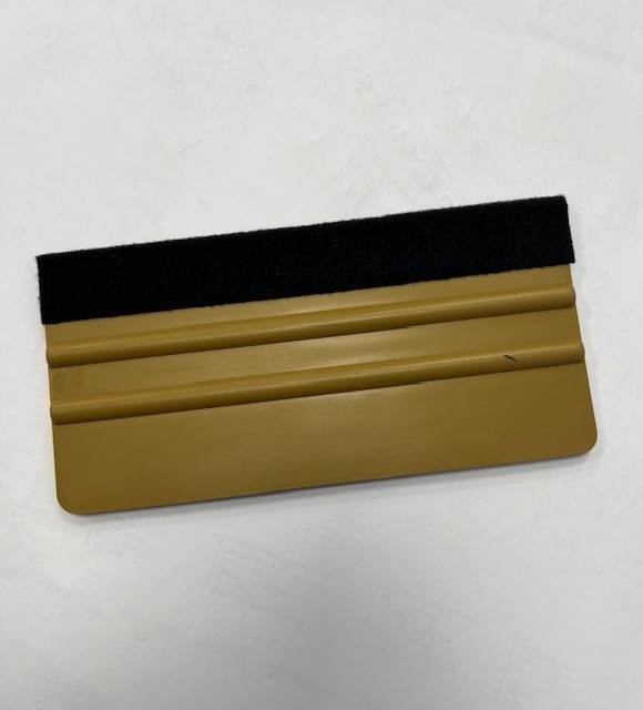 ESPATULA PLASTICO XXL ORO DE 15 CMS CON FIELTRO